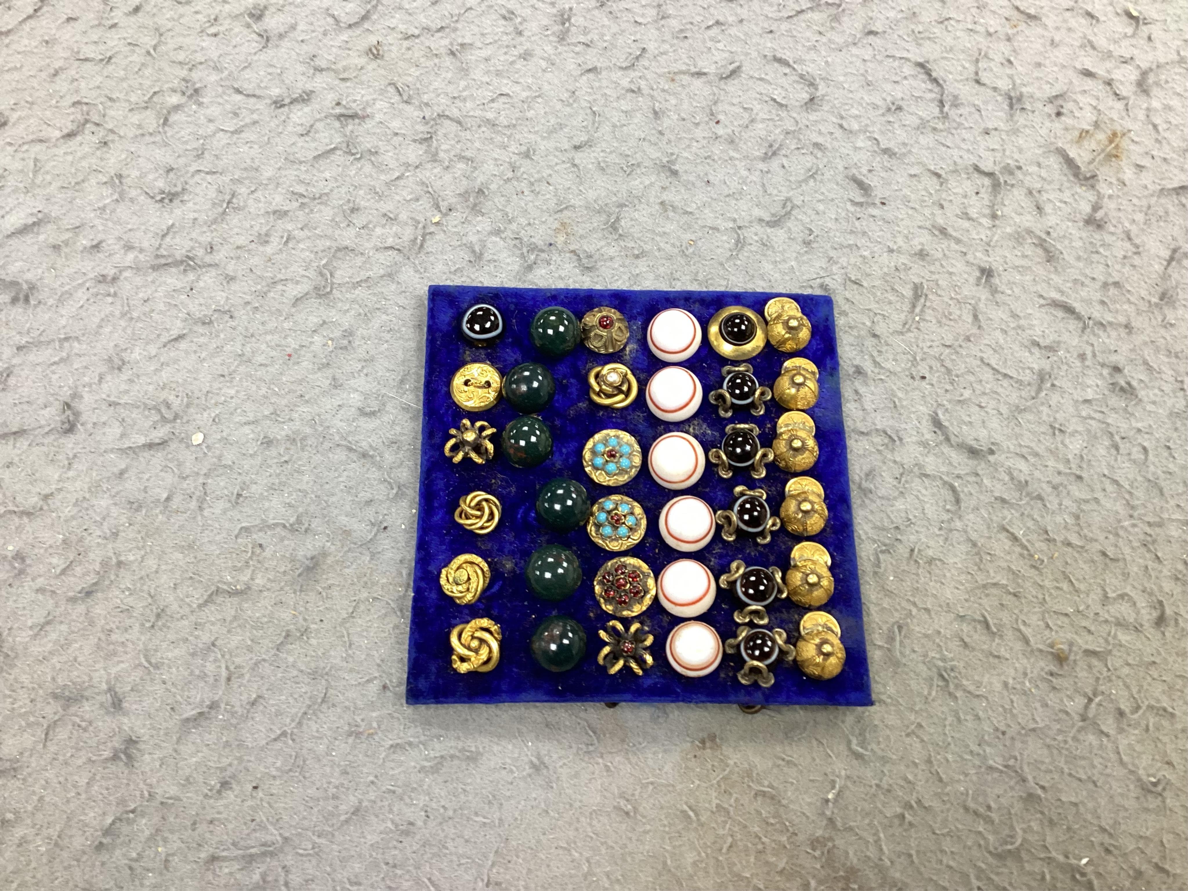 A good collection of assorted late Victorian/Edwardian buttons and dress studs;, Condition - good